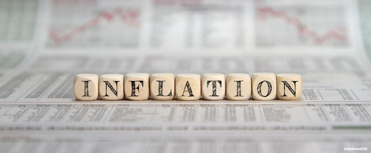 Plusieurs dés assemblés et composant le mot INFLATION
