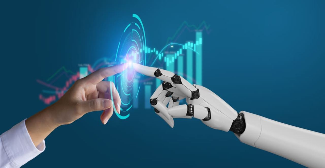 Une main humaine touchant la main d'un robot